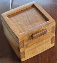 Small box for a hearing aid charger